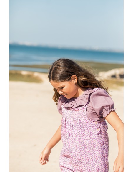 BLUSA VOLANTE CON GOMA ROSA