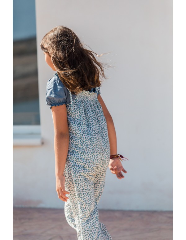 BLUSA VOLANTE CON GOMA AZUL