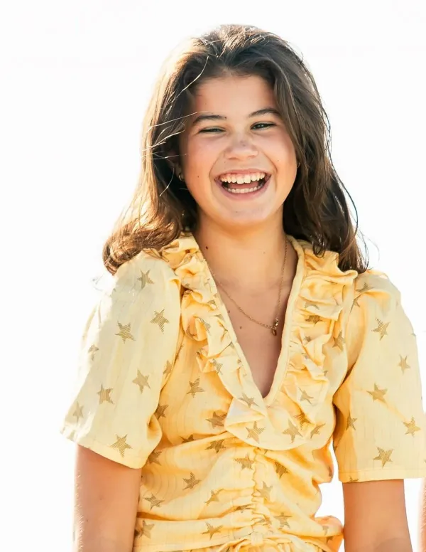 BLUSA ESTRELLAS MOSTAZA