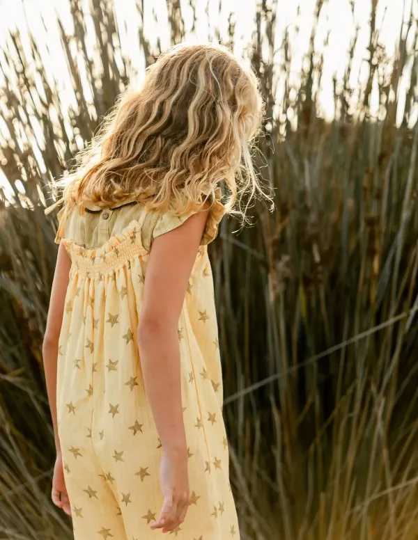 MONO ESTRELLAS MOSTAZA