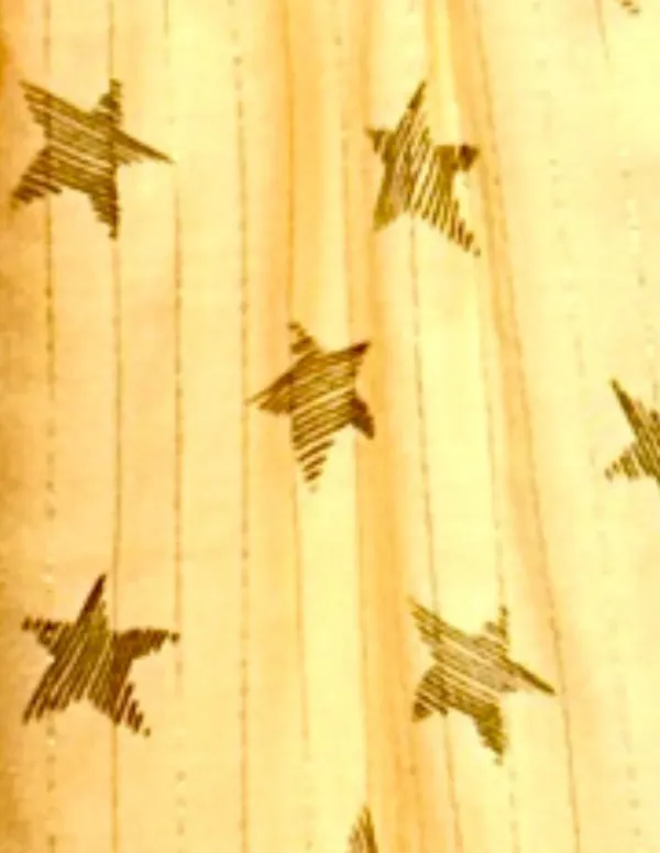 MONO ESTRELLAS MOSTAZA