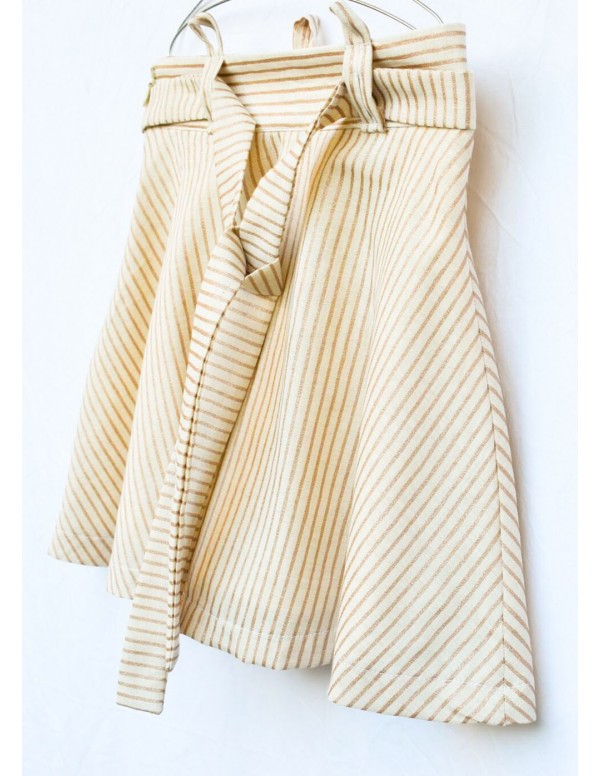 Falda tirantes purpurina arena