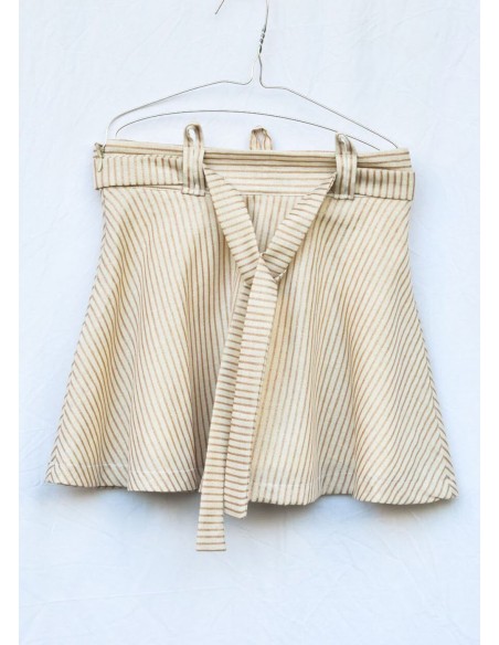 Falda tirantes purpurina arena