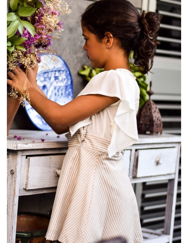 Falda tirantes purpurina arena