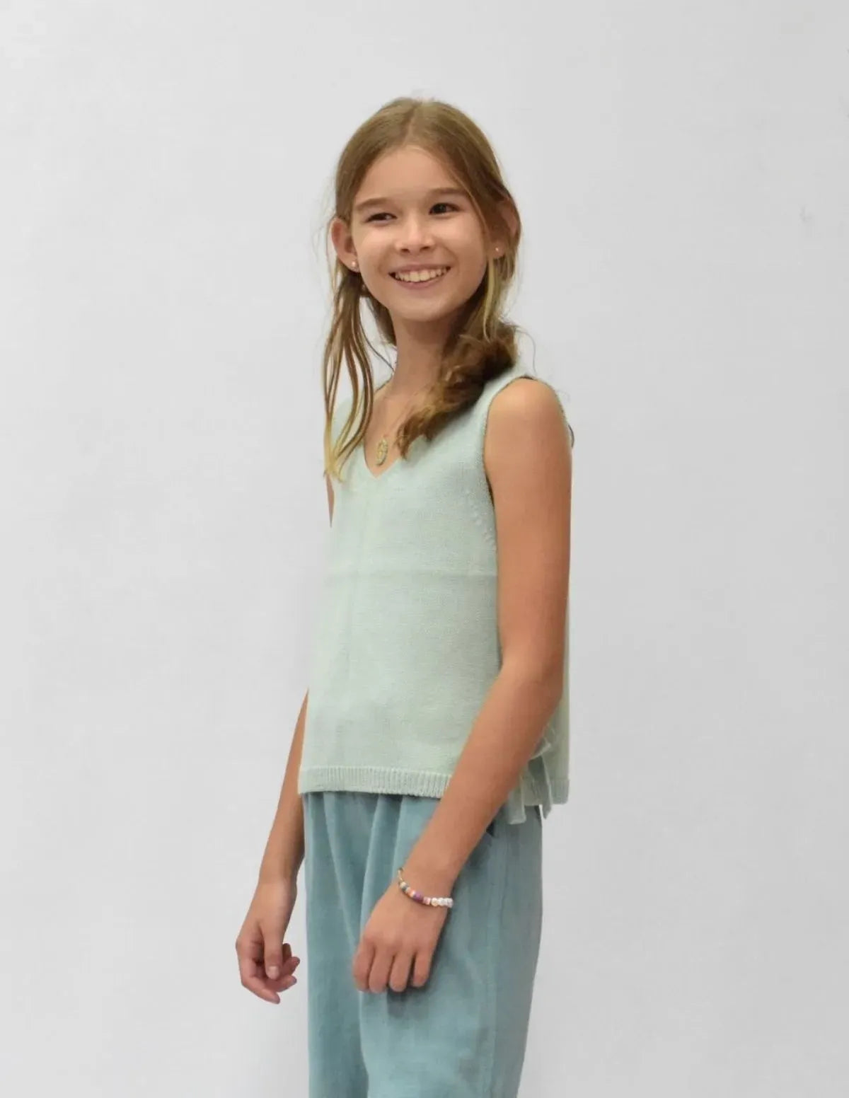 CHALECO PICO LAZOS AGUA NIÑA/TEEN